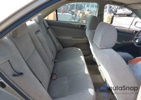 2003 Toyota Camry Le z USA, uszkodzony, nr VIN 4T1BE32KX3U704760